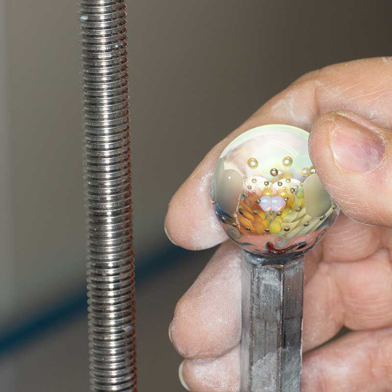 Faceting a second face angle on a glass marble